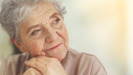 elderly woman looking thoughtful