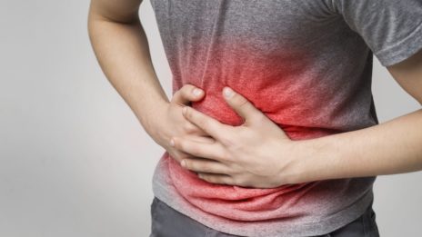Man holding painful stomach