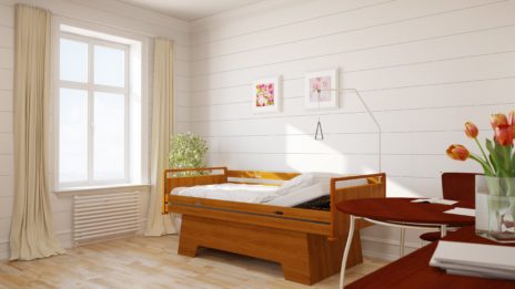 Bed with a hanging support in a home