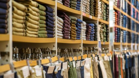 Pants stocked on shelves in retail store