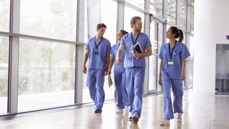 Doctors walking through hostpital